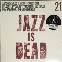 Load image into Gallery viewer, Adrian Younge & Ali Shaheed Muhammad / Antonio Carlos E Jocafi / Carlos Dafé / Hyldon / Joyce* & Tutty Moreno / Ebo Taylor / Dom Salvador / The Midnight Hour (2) : Jazz Is Dead 21 (LP, Red)
